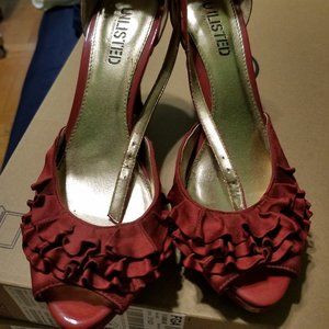 Unlisted Red Satin Platform Pumps.